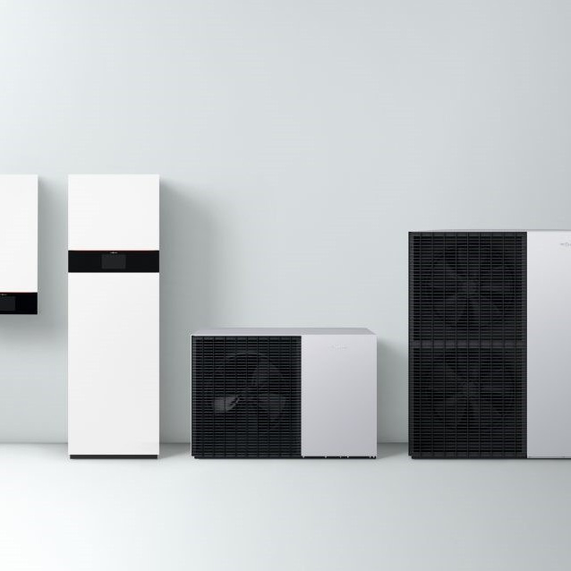 Air source heat pump unit installed on a home exterior